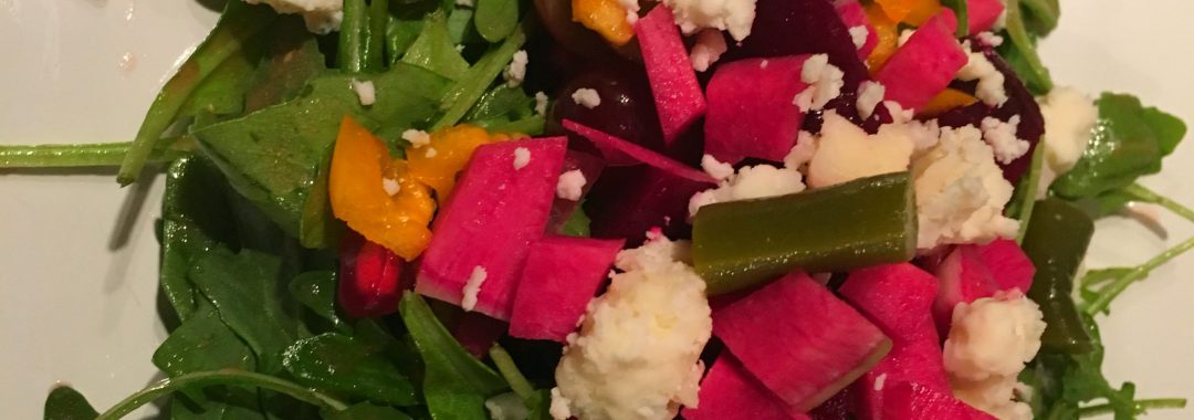 Baby Greens with MangoRadishSnow Pea, and GingerSesame Vinaigrette
